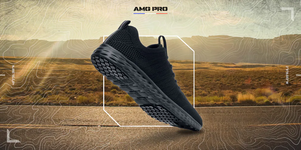 Bannière AMG PRO : chaussure de course noire sur une route du désert