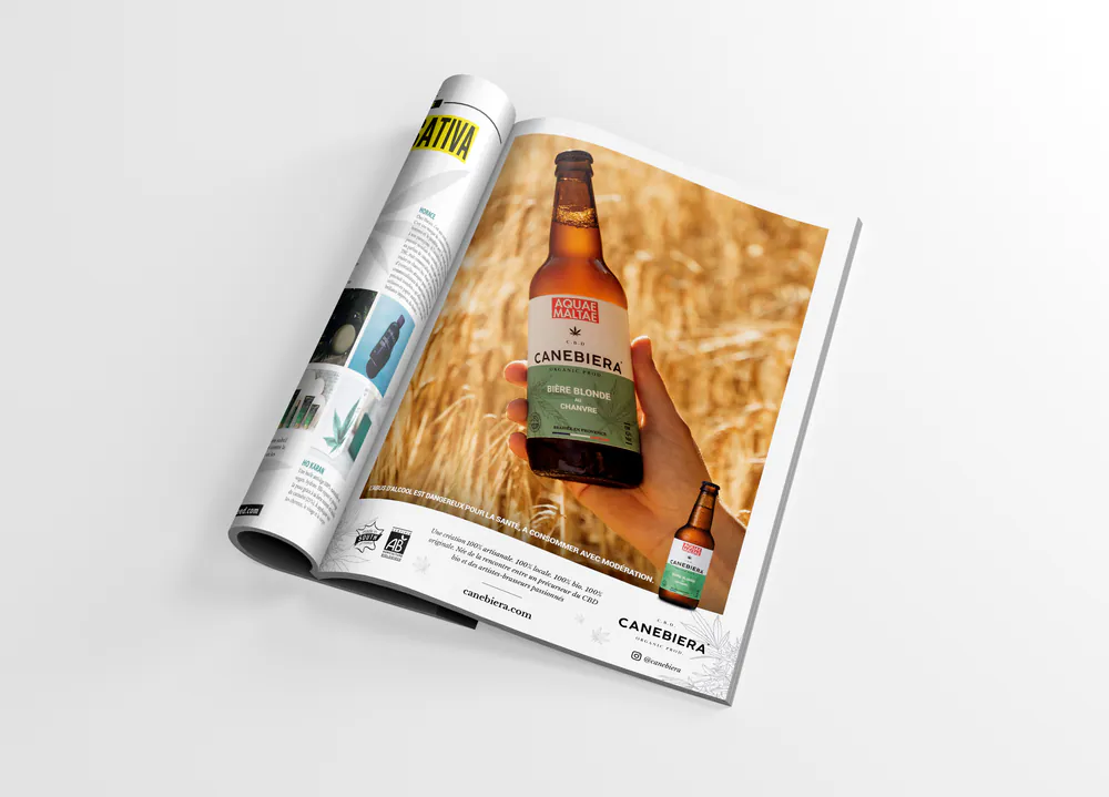Publicité presse Canebiera dans un magazine : bouteille de bière au chanvre dans un champ de blé